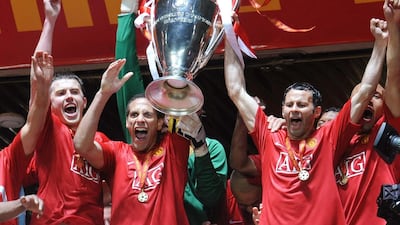 Left to right: Manchester United's Michael Carrick, Rio Ferdinand and Ryan Giggs.