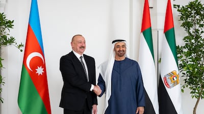 President Sheikh Mohamed bin Zayed and Ilham Aliyev, President of Azerbaijan, stand for a photograph before a meeting at Al Shati Palace. All photos: Presidential Court