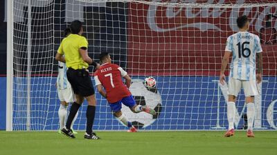Chile forward Alexis Sanchez begins to celebrate after scoring a goal against Argentina. EPA