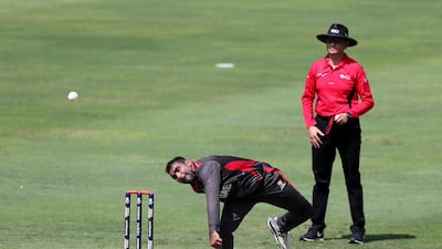 Ahmed bowls during the T20 World Cup qualifier warm up game between the UAE and Scotland at International Cricket Stadium, Dubai in October, 2019. Chris Whiteoak / The National