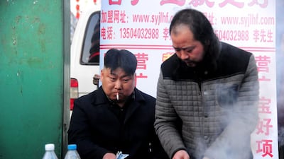 But he appears to lead a simpler existence than his powerful doppelganger — who is reported to enjoy a luxury lifestyle — and was seen at the weekend sitting on a small plastic stool, tending to his meaty wares.