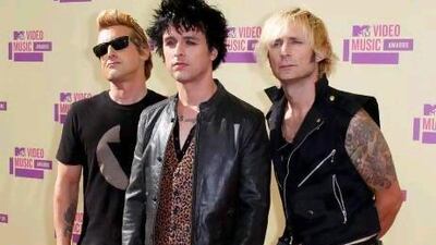Green Day, from left, Mike Dirnt, Billie Joe Armstrong and Tre Cool. Danny Moloshok / Reuters