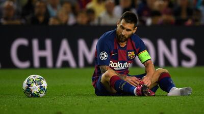 Messi lost a shoe. AFP