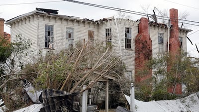 Rescuers raced to find survivors on Friday in the aftermath of a tornado-spawning storm system that barreled across parts of Georgia and Alabama. AP