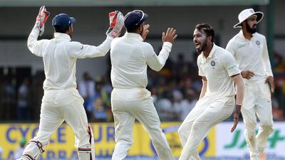 India all-rounder Hardik Pandya, second right, took the prized wicket of Sri Lanka's top-order batsman Kusal Mendis at Colombo on Saturday. Lakruwan Wanniarachchi / AFP