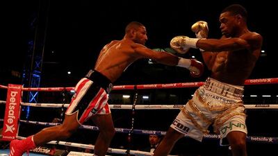 Kell Brook, left, in action against Errol Spence Jr during their IBF welterweight world championship contest at Bramall Lane on May 27, 2017 in Sheffield, England. Nigel Roddis/Getty Images