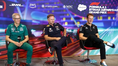 Christian Horner of Red Bull Racing, centre, Laurent Rossi of Alpine F1 Team, right, and Mike Krack of Aston Martin at Yas Marina Circuit. Victor Besa / The National