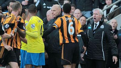 Alan Pardew, right, could face long-term ramifications for head-butting Hull City's David Meyler. Lindsey Parnaby / AFP