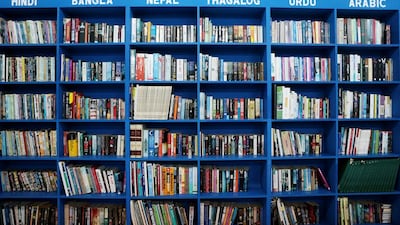 Books in the Saadiyat Accommodation Village library are categorized by language. Christopher Pike / The National