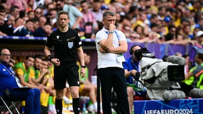 Ukraine's head coach Sergei Rebrov looks on. AFP