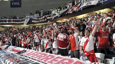 Fans cheer before the game between River Plate and Al Ain in the Fifa Club World Cup.