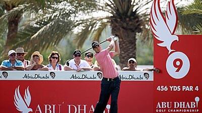 Martin Kaymer of Germany tees off in the third round of the Abu Dhabi Golf Championship yesterday. Kaymer leads going into the final round today.