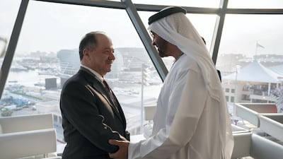 Sheikh Mohamed bin Zayed, Crown Prince of Abu Dhabi and Deputy Supreme Commander of the UAE Armed Forces (L), greets Masoud Barzani former President of the Kurdistan Region in Iraq (R), on the final day of the 2018 Formula 1 Etihad Airways Abu Dhabi Grand Prix, in Shams Tower. Ryan Carter / Ministry of Presidential Affairs