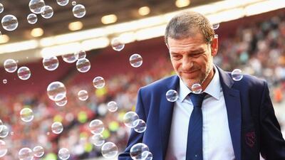 Slaven Bilic looks on as bubbles are blown during the Premier League match between West Ham United and Bournemouth at London Stadium on Sunday, August 21, 2016. Michael Regan / Getty Images