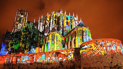 Digital images are projected on the cathedral “Saint Julien” in Le Mans, western France. Jean-Francois Monier / AFP