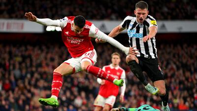 Newcastle goalkeeper Nick Pope saves at the feet of Arsenal's Gabriel Martinelli. Getty