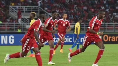 Republic of Congo midfielder Prince Oniangue, right, celebrates after scoring the lone, winning goal against Gabon on Wednesday night in the Africa Cup of Nations. Carl de Souza / AFP / January 21, 2015