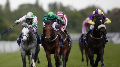 Jim Crowley rides Glass Office, left, to a surprise win in the The Duke of York Stakes at York on Wednesday. Alan Crowhurst / Getty Images