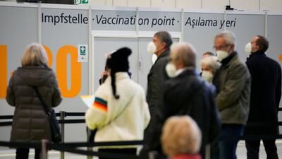 People wait to be inoculated at a vaccination centre in Berlin. AP