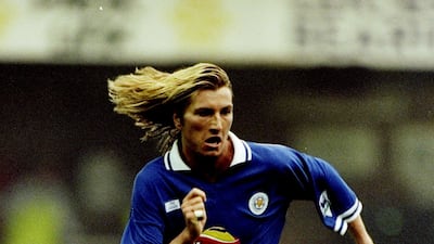 Robbie Savage - tigerish in the tackle and in the hair department during his Leicester days. Allsport