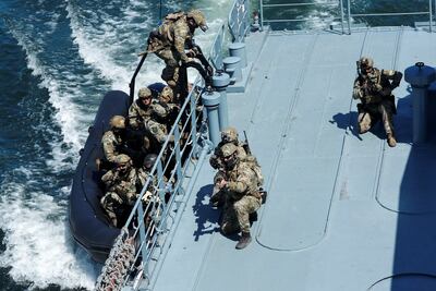 Special forces conduct boarding drills during a joint Romanian, British and US maritime exercise. Reuters