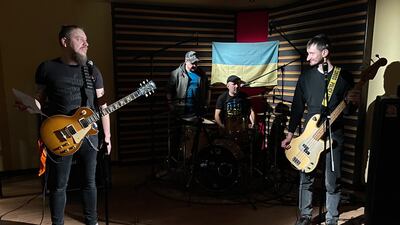 Beton band members, from left, Andriy Zholob, Mike Skyborn Kravets, Bohdan Hrynko and Oleg Hula in Skyborn Waves Studion in Lviv recording their resistance single 'Kyiv Calling'. PA Media