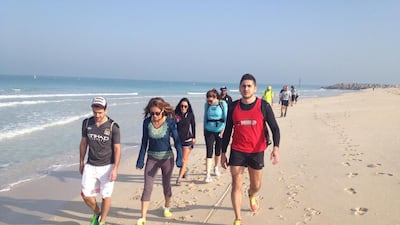 Take a beach hike led by Lisa from Gulf 4 Good, a charity organisation that aims to inspire participants to take part in challenge events in support of various charities. Courtesy Gulf 4 Good