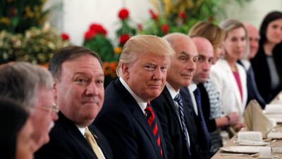 Chief of staff John Kelly (right) denies he called Donald Trump (left) an idiot. Reuters / Jonathan Ernst