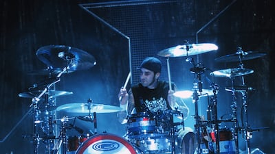 Travis Barker performs at the Shoreline Amphitheatre in Mountain View, California, in September 2001. Tim Mosenfelder / ImageDirect