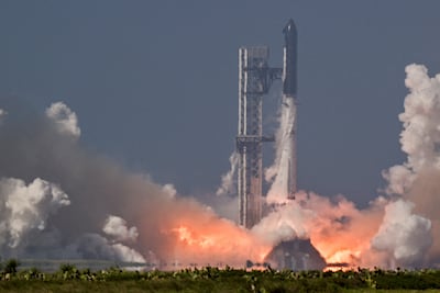 A SpaceX Super Heavy booster carrying a Starship spacecraft lifts from Texas, US. The company is seeking to raise $75 billion from its IPO. Reuters