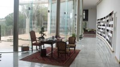 The Sehnaoui residence in Beirut. On the right wall is the inset shelf that launched the whole project. It is a digitised interpretation of the Arabic script and spells out the owners' names - Maurice and Hind - when seen upside down.