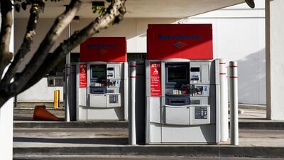 Drive-thru ATMs at a Bank of America branch inTexas. The lender has posted a strong earnings. Bloomberg