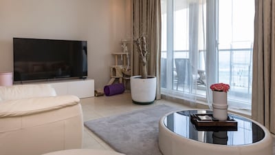 The TV area and balcony