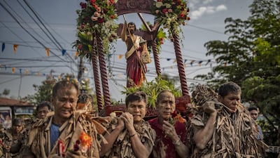 Devotees covered in mud and dried banana leaves take part in the Taong Putik ("mud people") Festival in the village of Bibiclat in Aliaga town, Nueva Ecija province, Philippines. Each year, the residents of Bibiclat village in Aliaga town celebrate the Feast of Saint John by covering themselves in mud, dried banana leaves, vines, and twigs as part of a little-known Catholic festival. Getty Images
