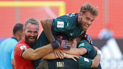 Italy celebrate after scoring against Tahiti in their Group B game. Italy won the game 12-4. EPA