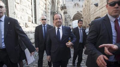 Francois Hollande (centre) arrives at the Church of St Anne in the Old City of Jerusalem, in a three-day visit to Israel and the Palestinian territories, his first to the region since he took office. Heidi Levine / EPA