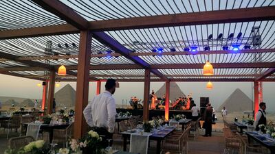 Waiters and employees at 9 Pyramids Lounge. Reuters