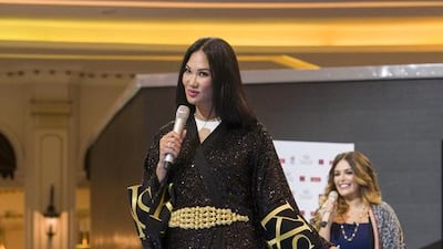 Kimora Lee Simmons addresses the crowd at the Dubai Summer Surprises Style Session at the Fashion Avenue in The Dubai Mall. Antonie Robertson / The National
