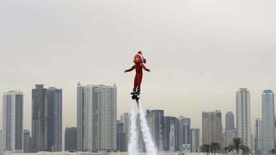 A man dressed as Nemo from the Pixar film Finding Nemo is seen during the Carnival at the Sharjah Aquarium. Jeffrey E Biteng / The National