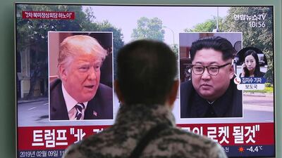 A man at Seoul Railway Station watches a TV report on the upcoming Trump-Kim summit on February 27-28, 2019. AP Photo