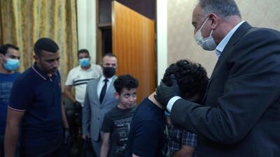 Iraqi Prime Minister Mustafa Al Kadhimi visits and offers condolences to the family of the late former government advisor and political analyst Hisham al-Hashemi, who was killed by gunmen, in Baghdad, Iraq July 8, 2020. Reuters