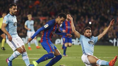 Barcelona’s Brazilian forward Neymar in action against Sergi Gomez of Celta Vigo. Alejandro Garcia / EPA