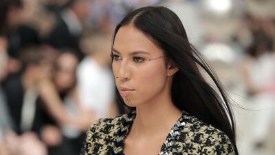 Make-up was kept light for First Nation model Quannah Chasinghorse at Chanel. EPA