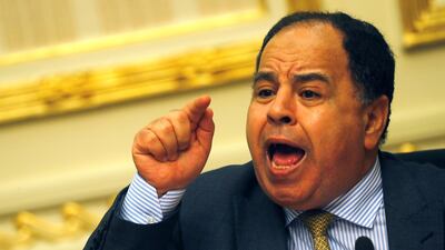 Egypt's Finance Minister Mohamed Maait gestures during a news conference in Cairo in July 2019. Reuters