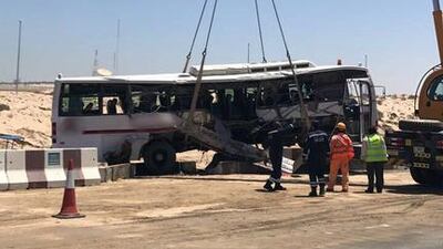 A crane lifts the bus after the crash in Dubai in which seven people were killed. Courtesy Dubai Police