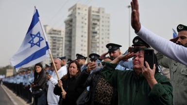 A convoy carrying Ran Gvili's remains drove to his burial place in southern Israel. Reuters