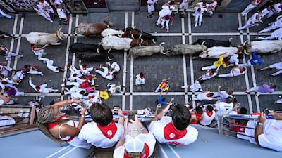 Bulls are run through Pamplona during the San Fermin festival in northern Spain. AFP