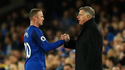 Wayne Rooney, left, is reportedly waiting to know about the situation with Sam Allardyce's future at Everton. Jan Kruger / Getty Images