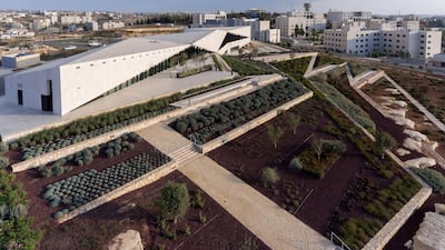 A still from Larissa Sansour’s ‘Nation State’ video, which depicts a solution for Palestine that condenses it into a high-rise theme park. Iwan Baan / The Palestinian Museum