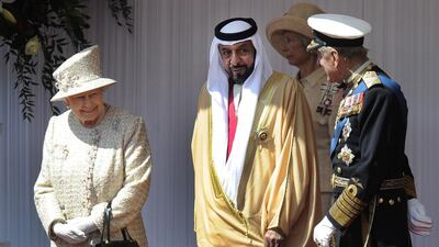 United Arab Emirates President Sheikh Khalifa Al-Nahyan, centre, is welcomed by Britain’s Queen Elizabeth II and the Duke of Edinburgh (right) at Windsor Castle near London April 30, 2013. Andy Rain / EPA